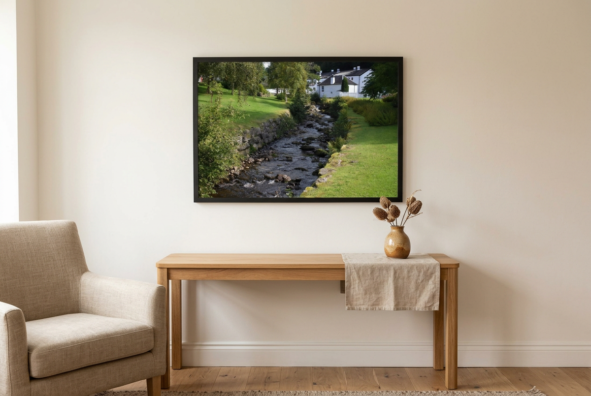 Illustrative room mock-up of Highland Tranquillity in a dark frame above an oak console table
